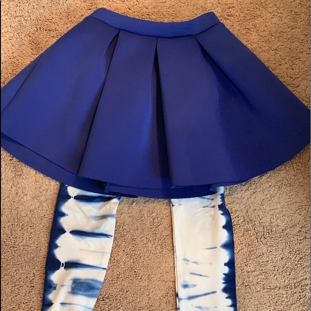 A cute set of a blue skirt and a tye die leggings